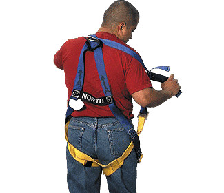 operator showing safety harness